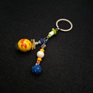 bijou de sac folklore jaune, ethnique, multicolore en perles et métaux